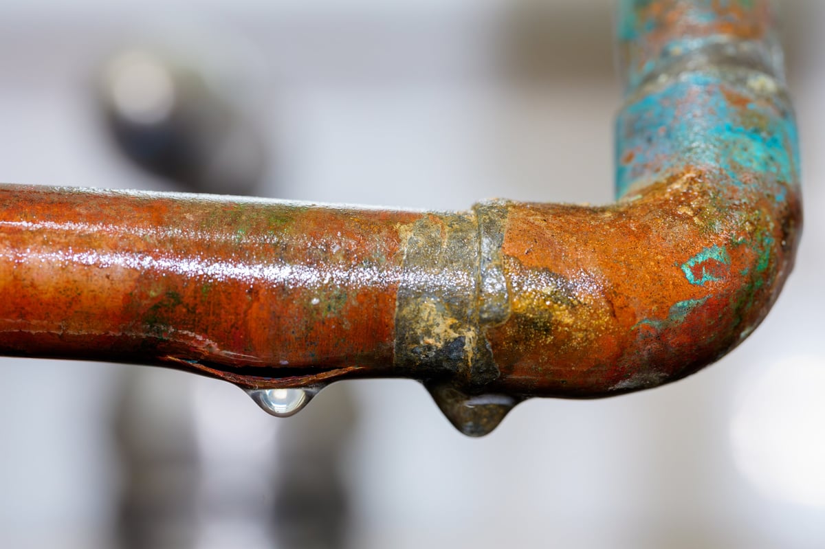 Leaking pipe with damage representing plumbing repair in older Lynnwood homes